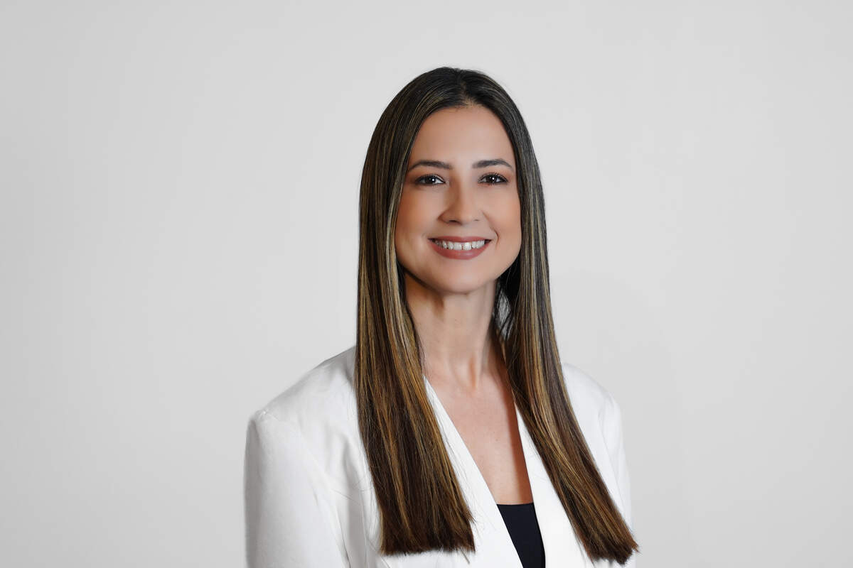 Fernanda Gomes, 46, a Venezuelan American real estate agent challenging Councilwoman Maureen Porras for Seat 2, says local officials should follow federal law while she promised to advocate for the immigrant community.